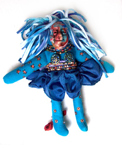 blue and orange Spirit Doll with polymer clay face